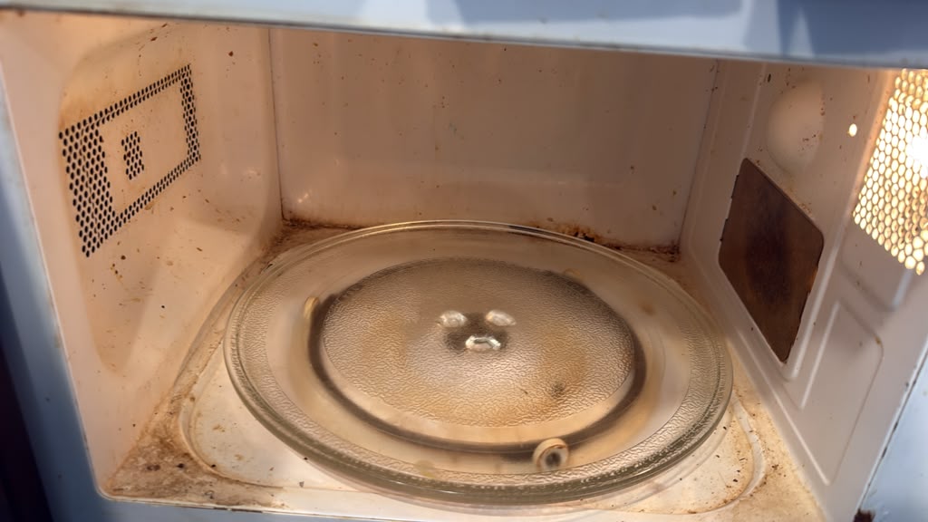 Inside the microwave before cleaning